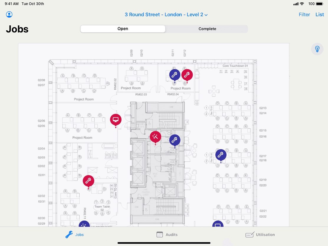 The Workplace app's job-tracking map, showing colour-coded pins across an office floor plan.