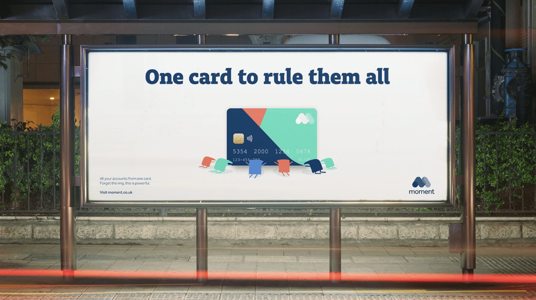 A billboard mockup reading "One card to rule them all," part of the Moment brand exploration.